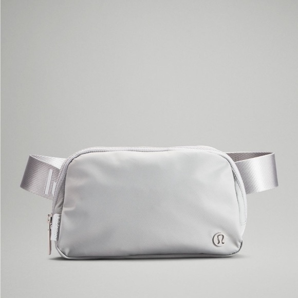 lululemon athletica Handbags - SOLD- NWT Lululemon Everywhere Belt Bag 1L silver drop/white